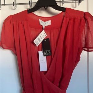 Burnt orange wrap dress. Never worn, brand new with tags